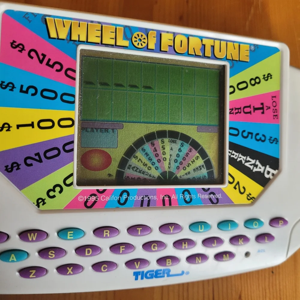Vintage 1995 Wheel Of Fortune Handheld Game